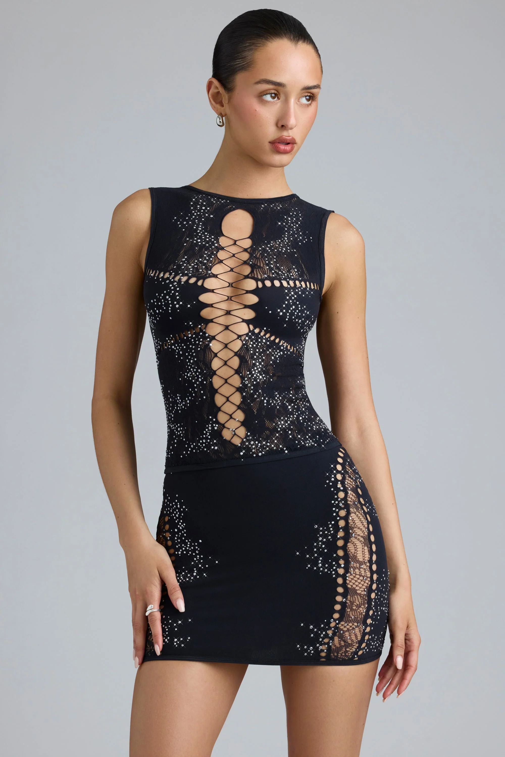 Embellished Mid-Rise Mini Skirt in Black - Image 11