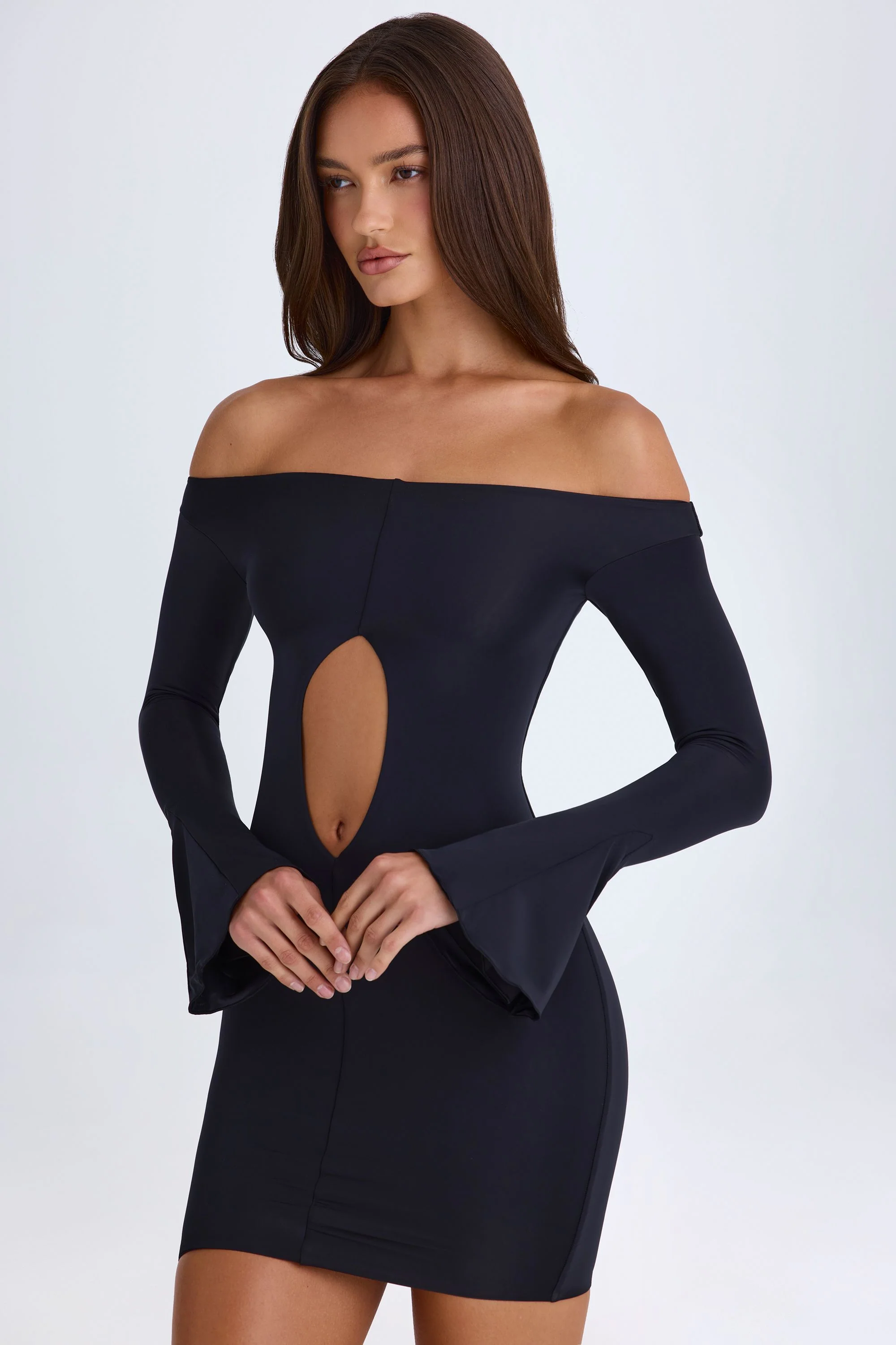 Off-Shoulder Cut-Out Mini Dress in Black - Image 6