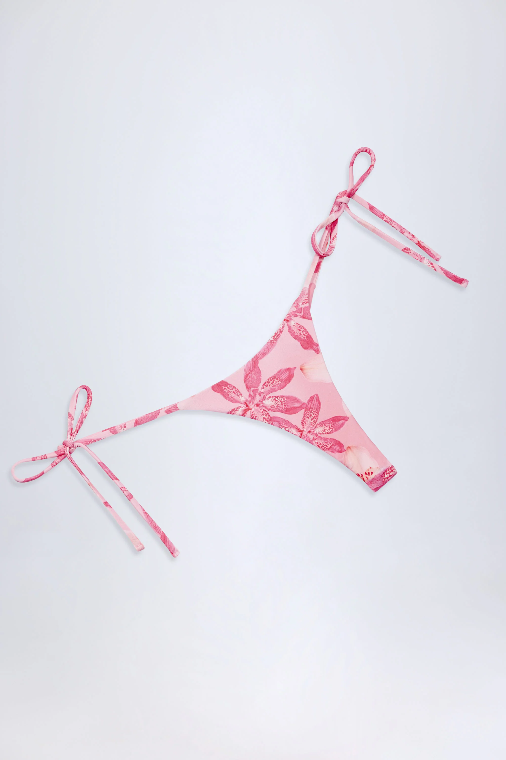 Side-Tie Thong Bikini Bottoms in Pink Orchid Print - Image 5