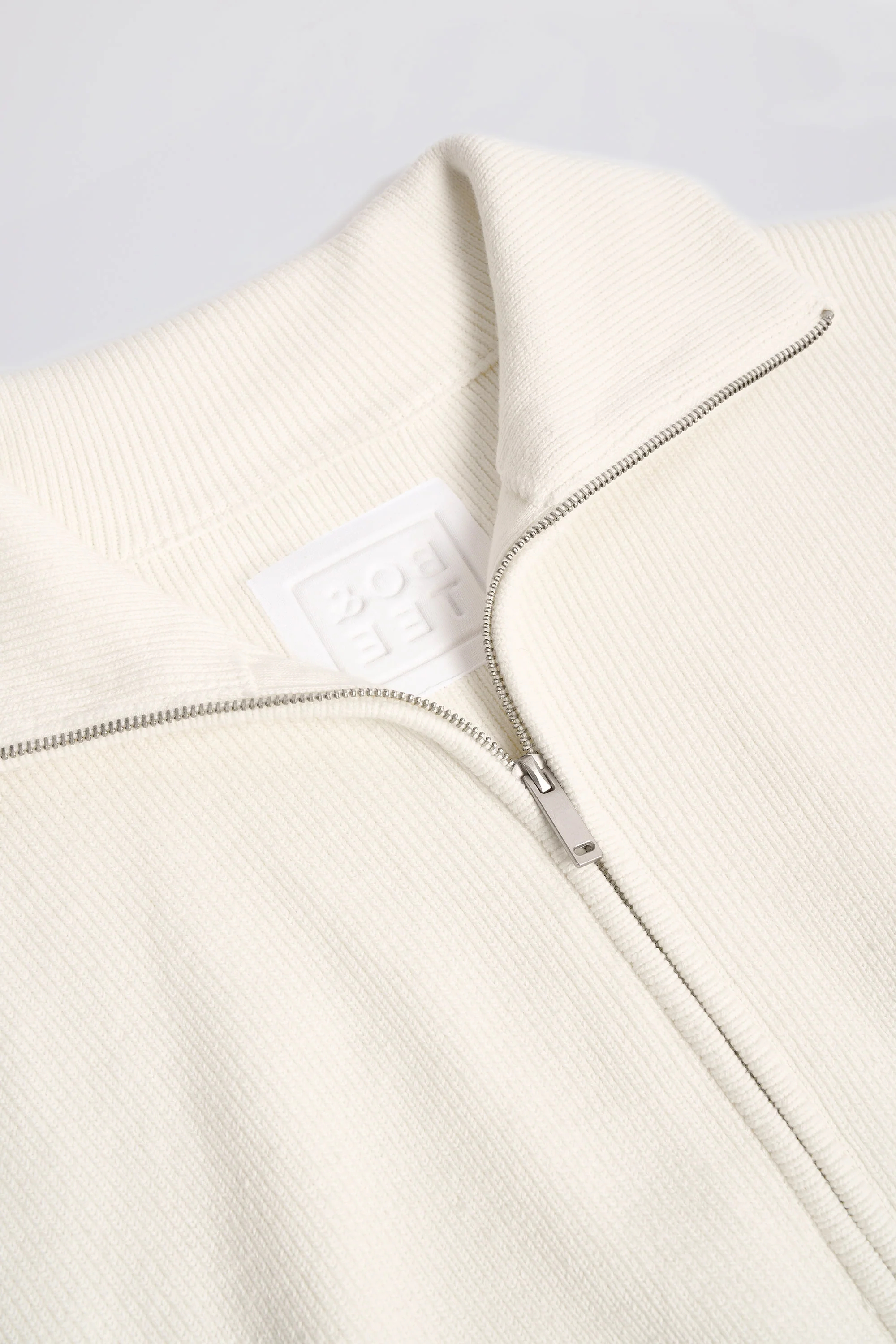 Ribbed Knit Zip-Up Cropped Sweatshirt in Ivory - Image 6