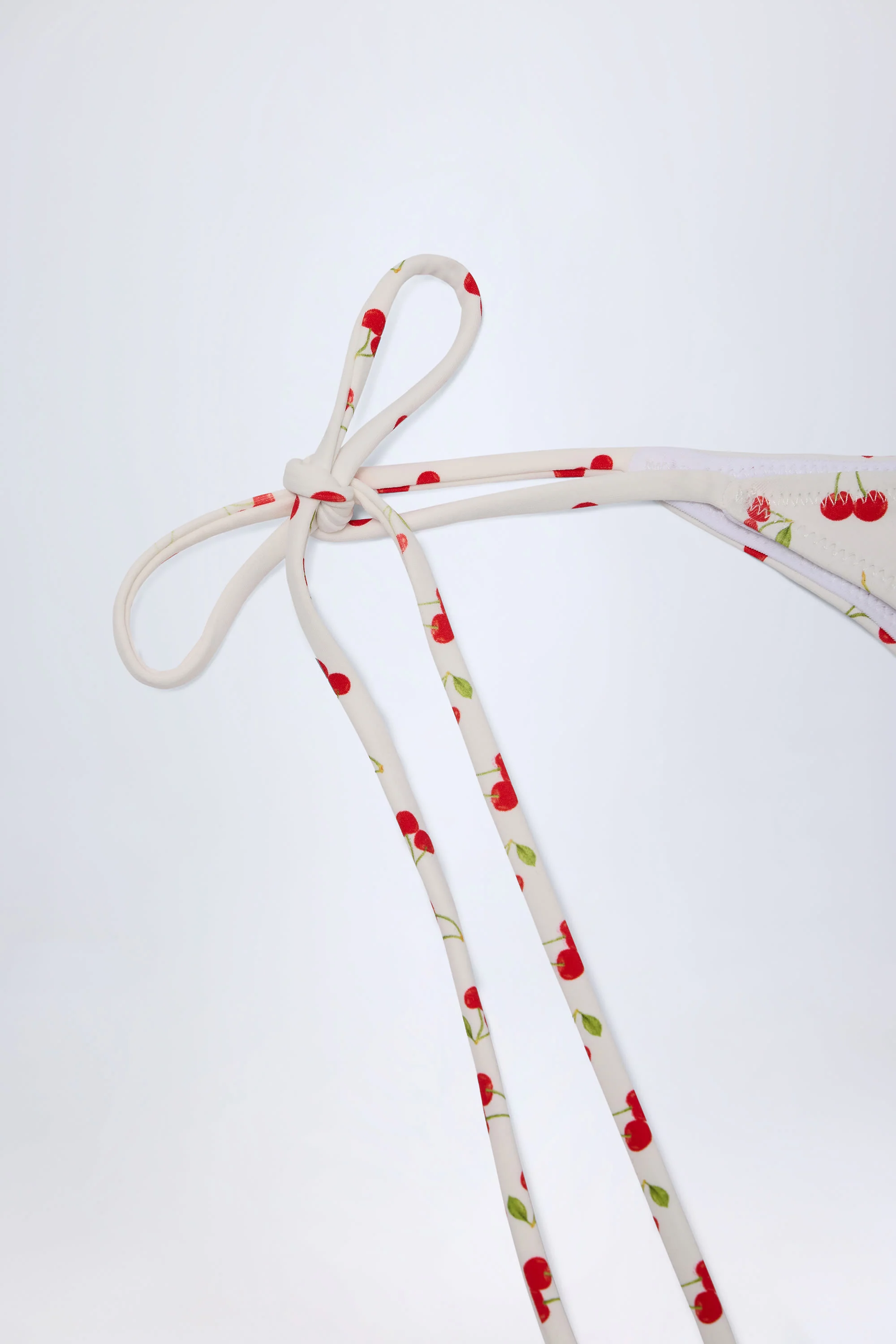 Side-Tie Cheeky Bikini Bottoms in Cherry Print - Image 7