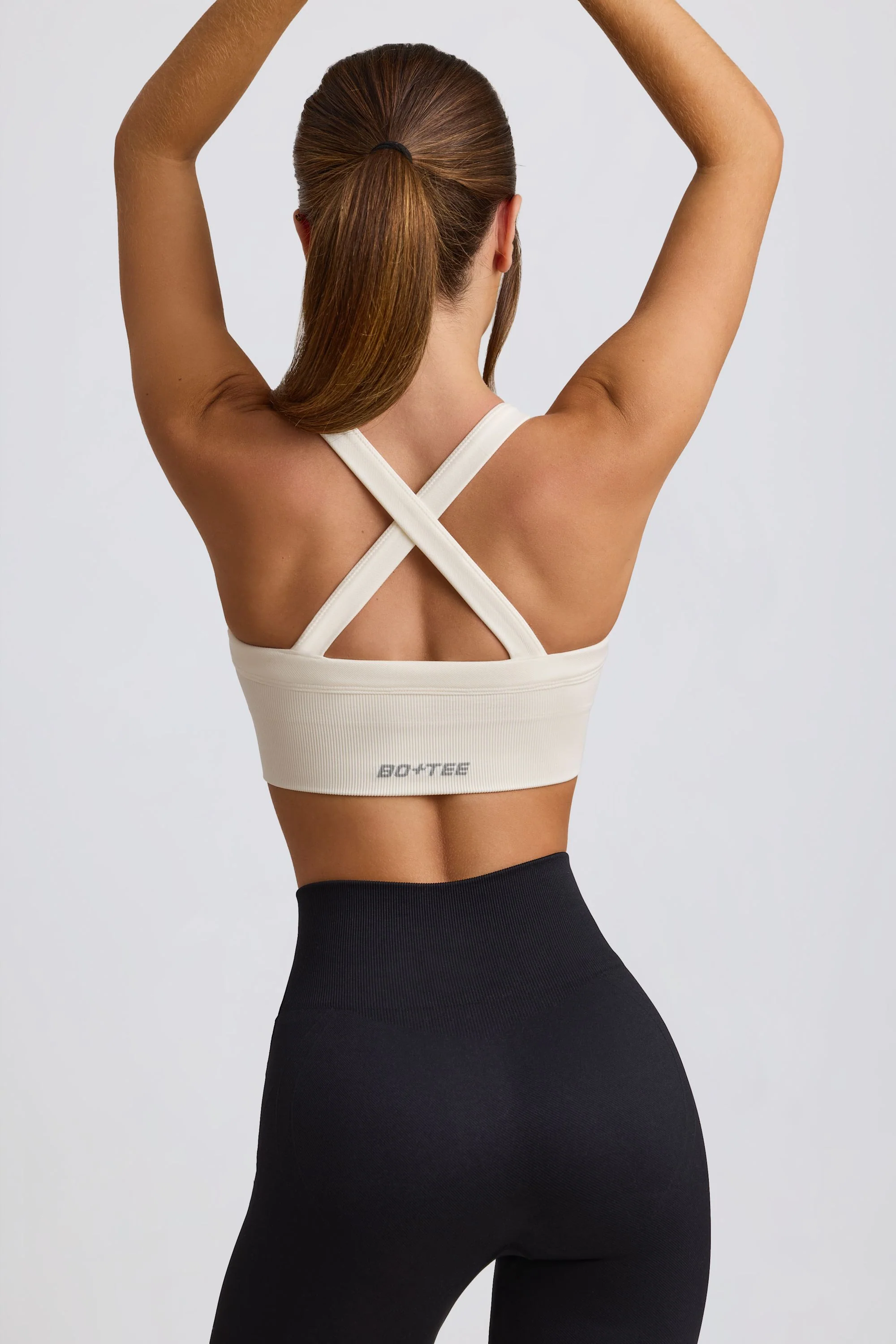 Super Sculpt Seamless Cross-Back Sports Bra in White - Image 2