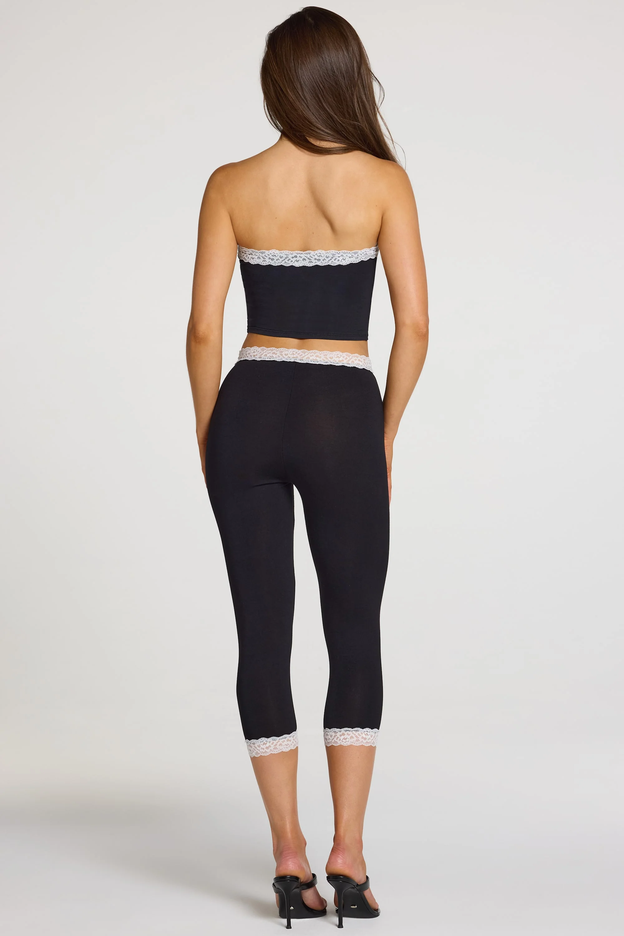 Modal Lace-Trim Mid-Rise Capri Leggings in Black - Image 7